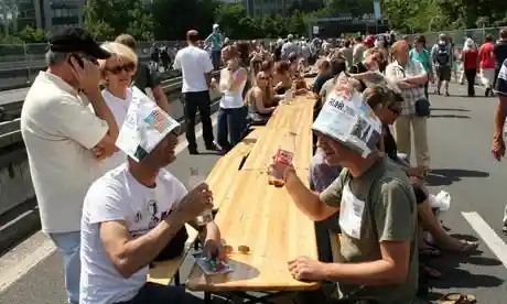 People-sit-on-tables-on-t-006.jpg