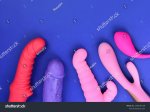 stock-photo-vibrator-sex-toys-for-women-on-a-blue-background-top-view-stock-photo-images-set-o...jpg